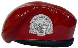 Red ceramic beret with an Air Force logo on a white background
